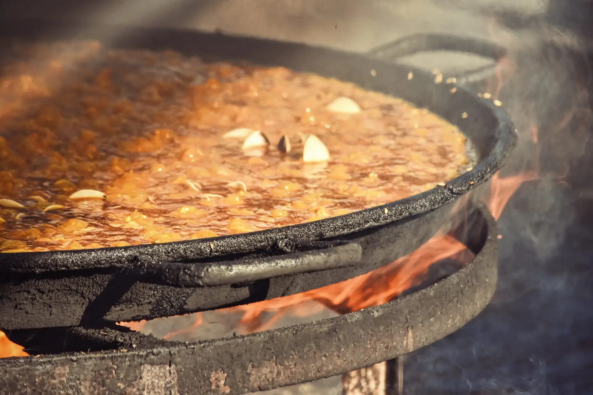 A delicious plate of traditional Spanish paella, filled with seafood, rice, and saffron, representing Spain’s rich culinary heritage.